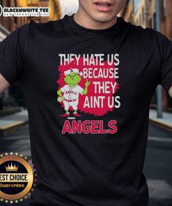 Official Los Angeles Angels Grinch Christmas T-Shirt featuring 'They Hate Ain't Us' design for festive fans.