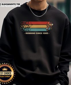 Official Mario Running Since 1985 Retro Gamer Sweatshirt featuring classic gaming design and vibrant colors for fans.