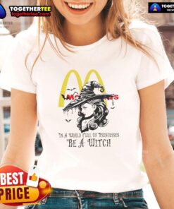 Official McDonald's Halloween tee for ladies featuring a witch design in a world of princesses.