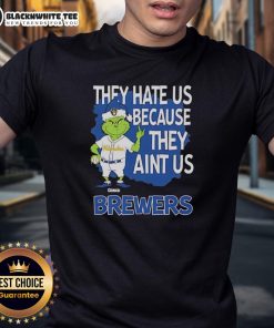 Official Milwaukee Brewers Grinch Christmas T-Shirt featuring 'They Hate Us Ain't Us' design for holiday fans.