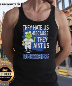 Official Milwaukee Brewers Grinch Christmas tank top featuring 'They Hate Us Ain't Us' design for festive baseball fans.