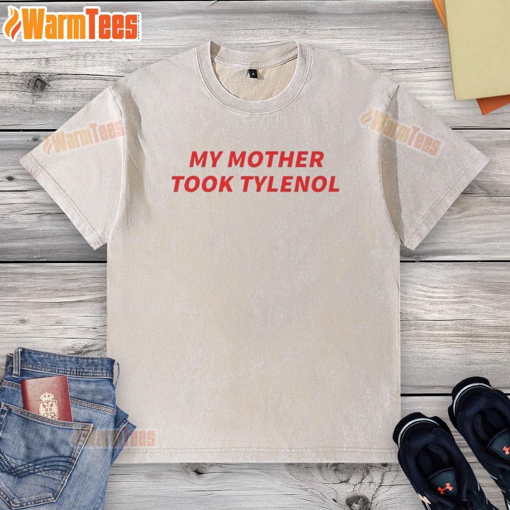 Official My Mother Took Tylenol Washed T Shirt Official My Mother Took Tylenol washed t-shirt displayed on a hanger, showcasing humorous text design and soft fabric.