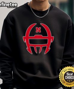 Official Nebraska Football Matt Rhule logo sweatshirt featuring team colors and emblem for fans and players.