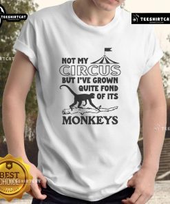Official 'Not My Circus But I've Grown Quite Fond Of Its Monkeys' T-Shirt featuring a playful design and vibrant colors.