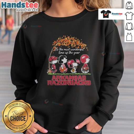 Alt Text: Official Peanuts Characters x Arkansas Razorbacks NFL sweatshirt for the holidays - It's the Most Wonderful Time of the Year.
