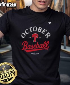 Alt Text: Official Philadelphia Phillies October Baseball 2025 MLB Postseason locker room T-shirt featuring team logo and design.