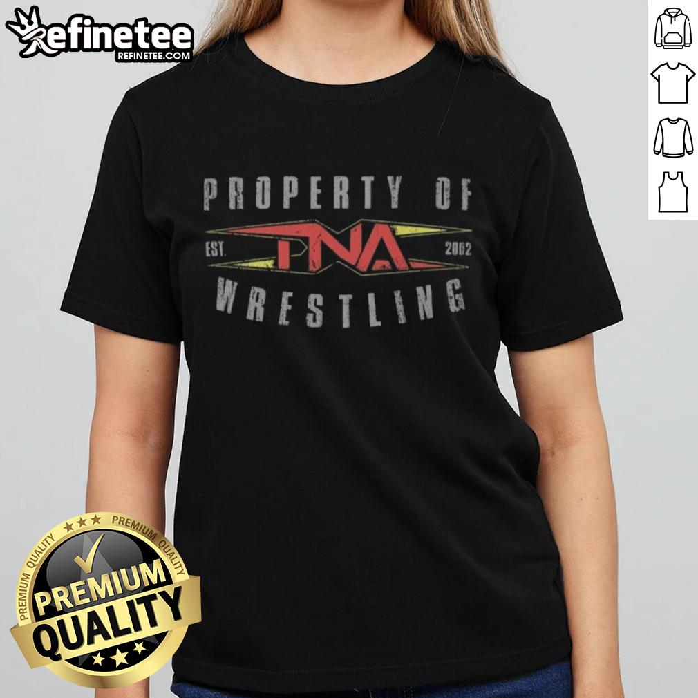 Official Property Of Tna Wrestling Est 2002 Ladies Tee Alt Text: Official TNA Wrestling Est 2002 Ladies Tee featuring logo and stylish design for wrestling fans.