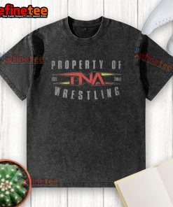 Alt Text: Official Property of TNA Wrestling Est 2002 washed t-shirt, featuring a vintage design and comfortable fit.