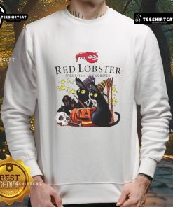 Official Red Lobster Black Cat Witch Pumpkin Haunted House Halloween Sweatshirt featuring festive Halloween designs.
