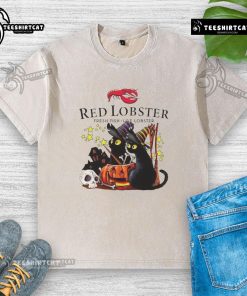Official Red Lobster black cat witch pumpkin haunted house Halloween washed t-shirt design featuring spooky elements.