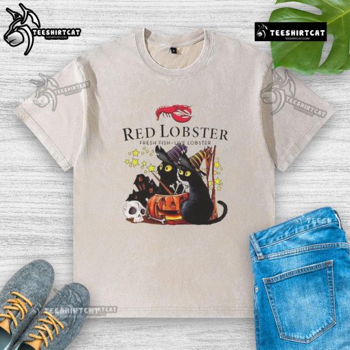 Official Red Lobster black cat witch pumpkin haunted house Halloween washed t-shirt design featuring spooky elements.