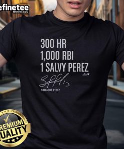 Alt Text: Official Salvador Perez 300 Homers & 1,000 RBI T-Shirt featuring bold graphics celebrating his baseball achievements.
