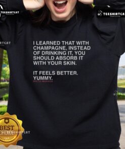 Shota Imanaga sweatshirt featuring the phrase 'I learned that champagne instead of drinking it, absorb it with your skin'.