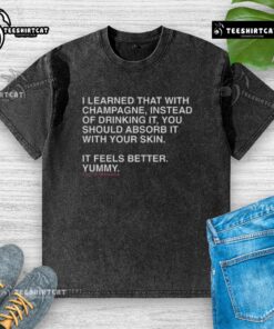 Shota Imanaga wearing a washed T-shirt with a quote about absorbing champagne with skin instead of drinking it.