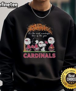 Alt Text: Official Snoopy The Peanuts Arizona Cardinals sweatshirt for the holiday season, showcasing festive design and comfort.