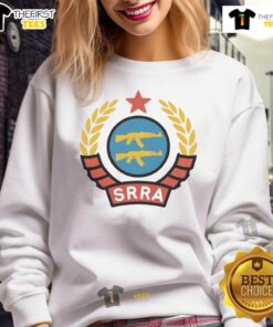 Alt Text: Official SRRA Socialist Redditor Rifle Association logo on a stylish sweatshirt, perfect for passionate supporters.