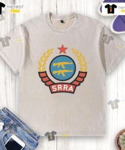 Official SRRA Socialist Redditor Rifle Association logo on a washed t-shirt, showcasing a unique design for fans.
