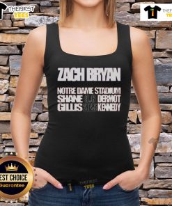 Zach Bryan performing live in concert at Notre Dame, wearing an official tank top, September 6, 2025.