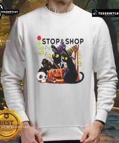 Official The Stop And Supermarket Black Cat Witch Pumpkin Haunted House Halloween Sweatshirt for festive style.