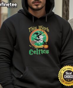 Official 'This Witch Loves The Boston Celtics' Snoopy Halloween Hoodie featuring a playful design and team colors.