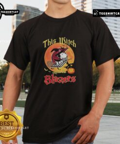Alt Text: Official This Witch Loves The Portland Trail Blazers Snoopy Halloween T-Shirt featuring a playful design with Snoopy.