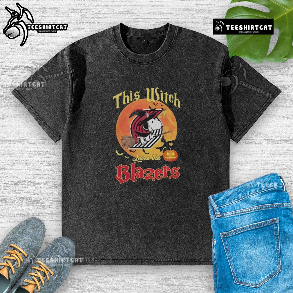 Official This Witch Loves The Portland Trail Blazers Snoopy Halloween Washed T-Shirt Alt Text: Official Snoopy Halloween T-shirt with 'This Witch Loves the Portland Trail Blazers' design, perfect for fans.