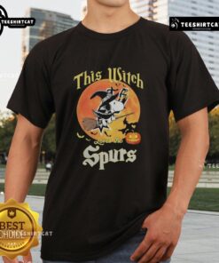 Official This Witch Loves The San Antonio Spurs Snoopy Halloween T-Shirt featuring Snoopy in a witch costume with Spurs logo.