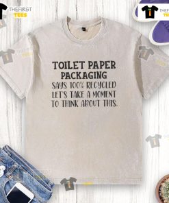 Alt Text: Official toilet paper packaging labeled 100% recycled beside a washed t-shirt, promoting eco-friendly choices.