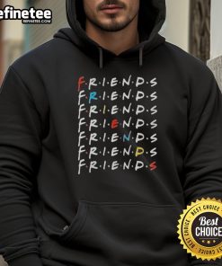 Alt Text: Official Travis Kelce wearing a Friends TV series hoodie, showcasing his sporty style and love for the classic show.