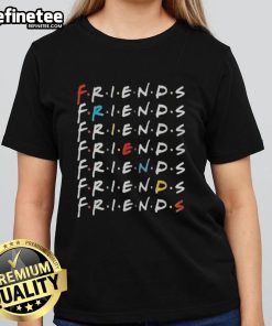 Alt Text: Official Travis Kelce wearing Friends TV series ladies tee, showcasing stylish fan apparel for women.