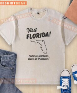 Official Visit Florida t-shirt featuring 'Come for Vacation, Leave on Probation' slogan, perfect for playful travel enthusiasts.