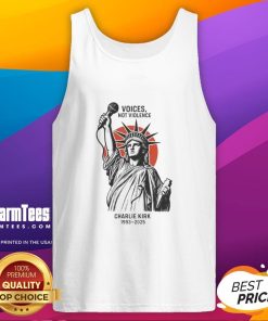 Charlie Kirk wearing a 'Voices Not Violence' tank top in front of the Statue of Liberty, promoting peace and unity.