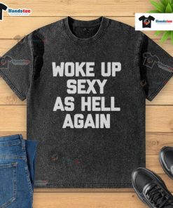Official Woke Up Sexy As Hell Again washed t-shirt displayed on a hanger, showcasing its trendy design and soft fabric.