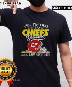 Alt Text: Official Yes I'M Old But I Saw Kansas City Chiefs Greatness T-Shirt featuring Super Bowl helmet and skyline design.