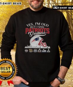 Men's sweatshirt featuring New England Patriots Super Bowl helmet and skyline design, celebrating team greatness and nostalgia.