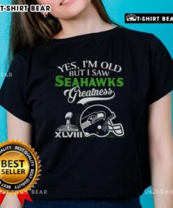 Seattle Seahawks Super Bowl helmet with skyline, featuring 'Yes I'm Old But I Saw Greatness' on a ladies' tee.