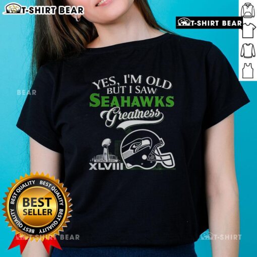 Seattle Seahawks Super Bowl helmet with skyline, featuring 'Yes I'm Old But I Saw Greatness' on a ladies' tee.