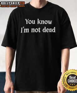Alt Text: Official You Know I'm Not Dead T-Shirt featuring bold text design on a stylish black background for casual wear.
