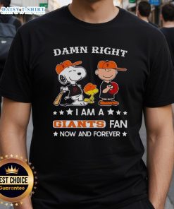 Alt Text: Original Damn Right I Am A Giants Fan Now And Forever T-Shirt featuring Snoopy and Charlie Brown in team colors.