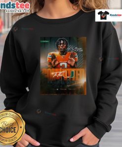 De Marcus De Roche in Miami Hurricanes sweatshirt, showcasing commitment to team spirit and athletic pride.