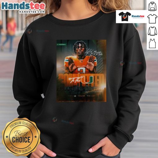 De Marcus De Roche in Miami Hurricanes sweatshirt, showcasing commitment to team spirit and athletic pride.
