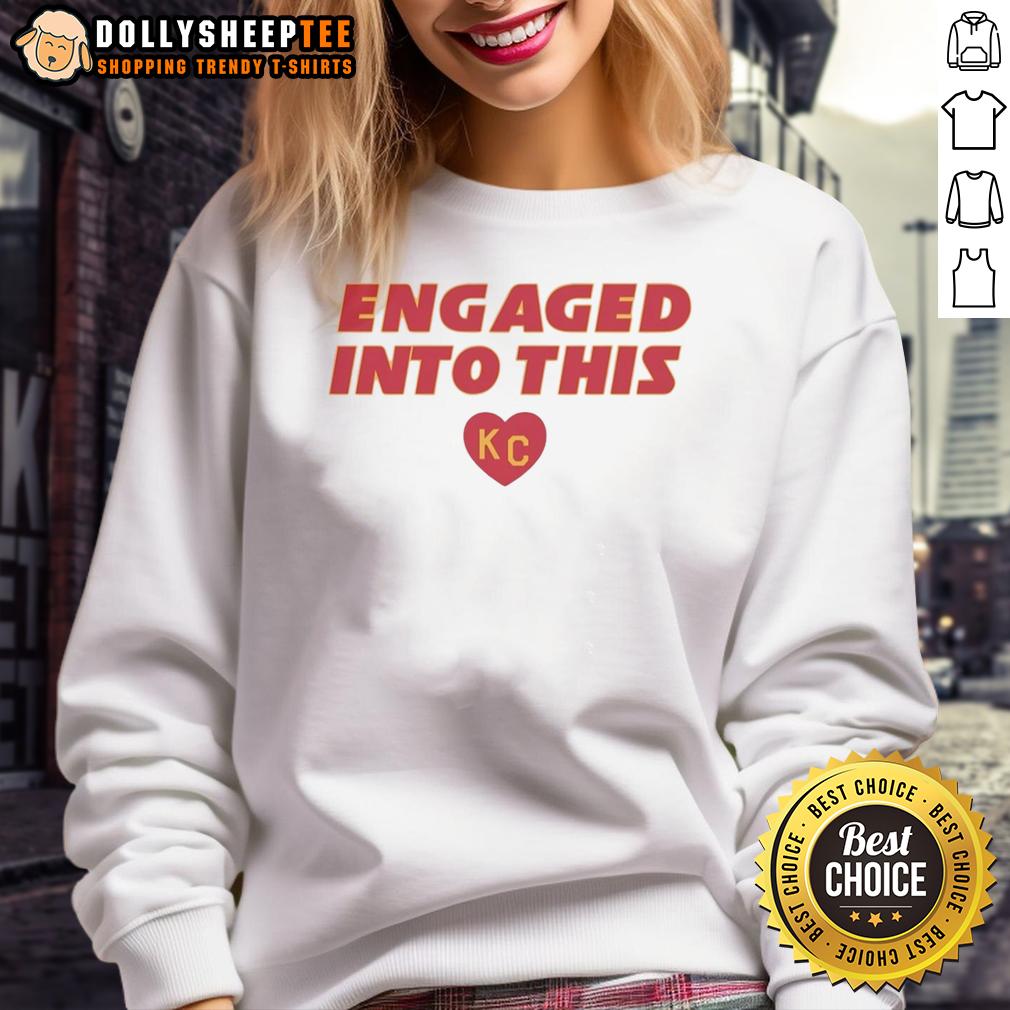 Original Engaged Into This Kc Travis Kelce And Taylor Sweatshirt Alt Text: Original Engaged Kc Travis Kelce and Taylor Sweatshirt featuring stylish design for fans of the celebrity couple.