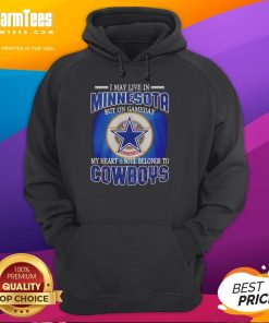 Cozy hoodie with 'I May Live In Minnesota But My Heart Belongs To Dallas Cowboys' design, perfect for NFL fans.