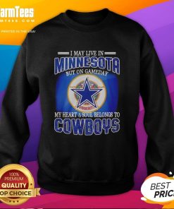 Cozy sweatshirt featuring 'I May Live In Minnesota, But On Gameday My Heart Belongs To Dallas Cowboys Fans' design.