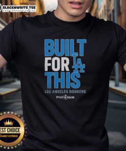 Alt Text: Original Los Angeles Dodgers Built For This MLB Postseason 2025 T-Shirt featuring team logo and vibrant design.