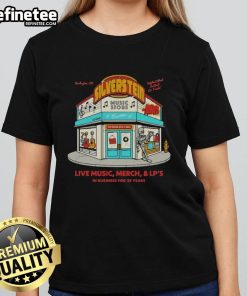 Original Music Store in Burlington celebrates 25 years with vintage ladies tee showcasing live music legacy.