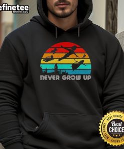 Vintage Peter Pan silhouette hoodie featuring 'Never Grow Up' design, perfect for fans of classic fairy tales and nostalgia.