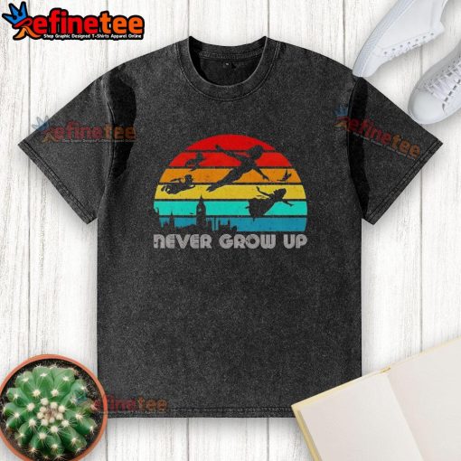 Vintage washed t-shirt featuring an original Peter Pan silhouette with 'Never Grow Up' text design.