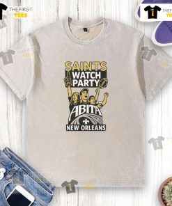 Alt Text: Original New Orleans Saints watch party t-shirt featuring Abita logo, perfect for football fans.