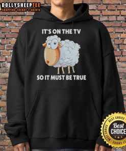 Original Sheep It's On The TV So It Must Be True Hoodie featuring a playful sheep design for cozy casual wear.